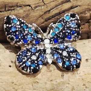 Elegant Butterfly Brooch with Blue and Silver Tone  Accents